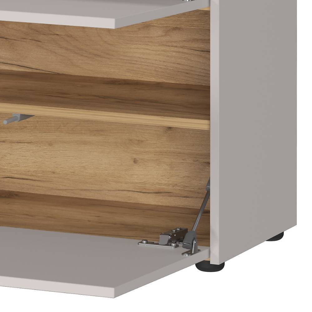 Nahaufnahme des unteren offenen Fachs mit Holzregal und Klappenmechanismus – Osasco