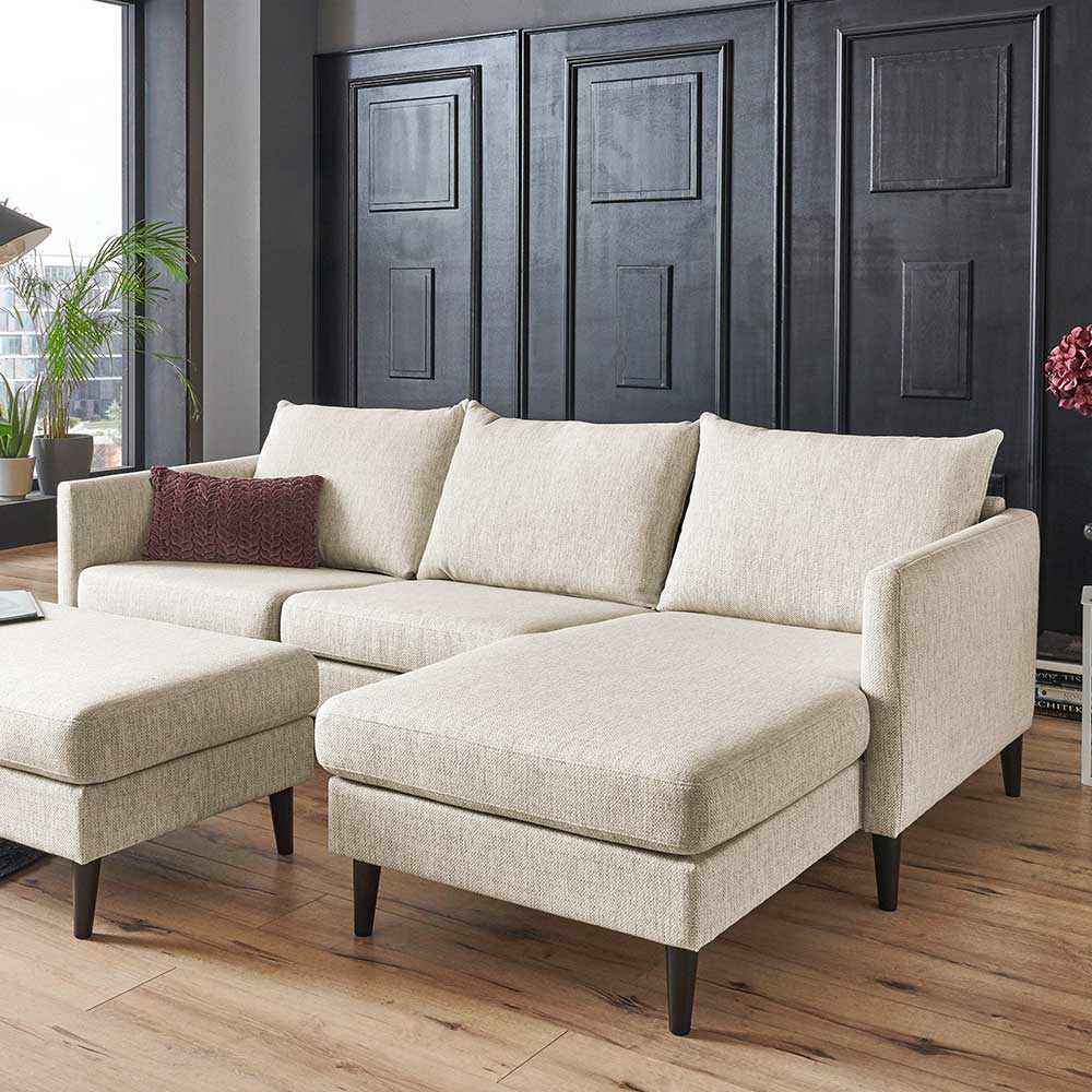 Kleines L-Sofa in Creme und Schwarz Rücken echt bezogen