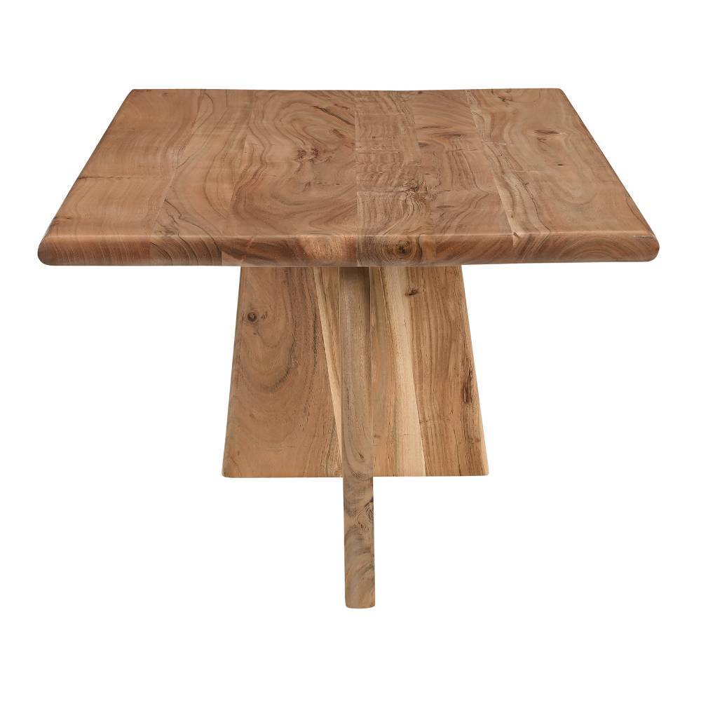 Akazienholz-Couchtisch mit natürlicher Maserung und markanten Holzbeinen von oben – Bagavano