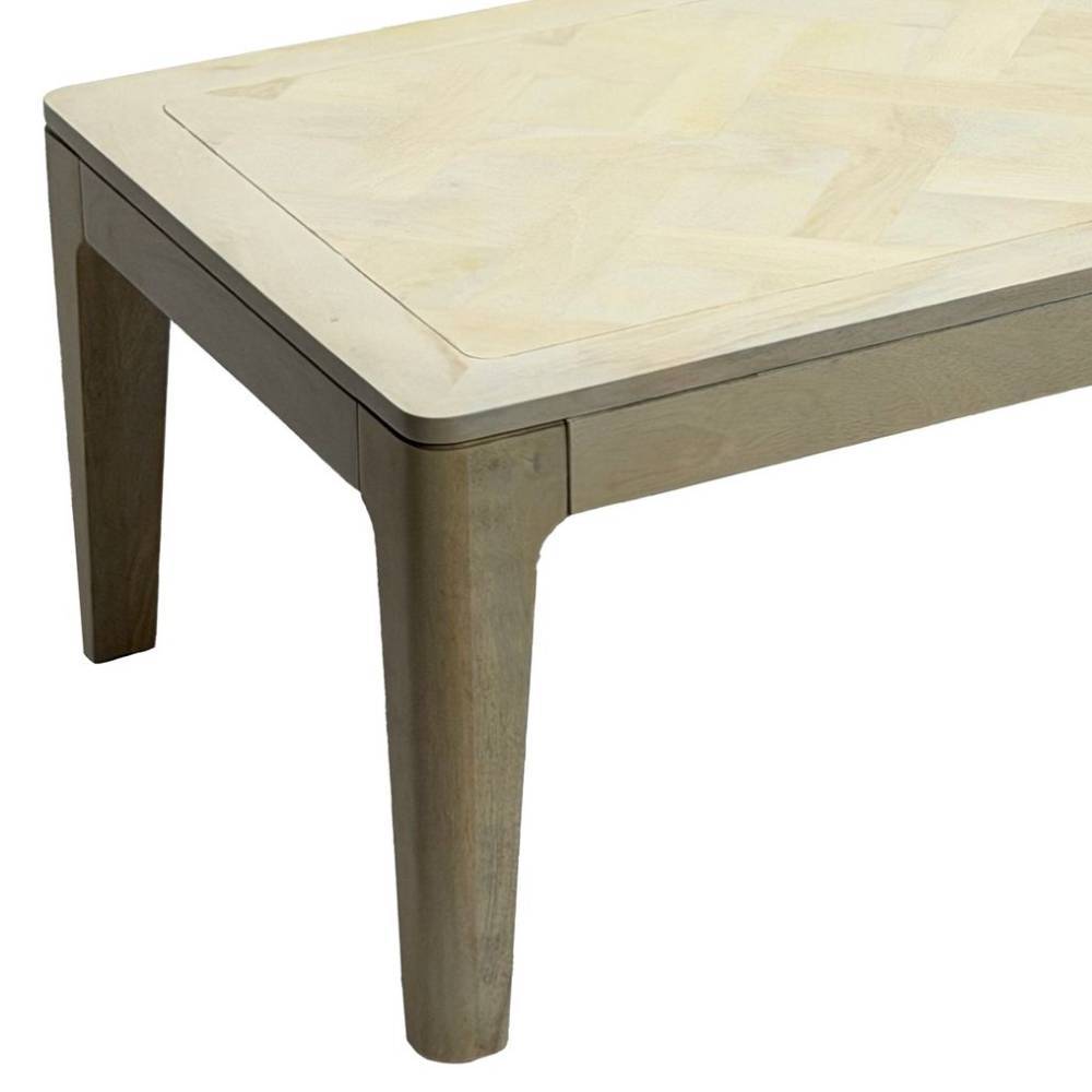 Seitenansicht des White Wash Couchtisches aus Mangoholz mit stabilen, konischen Tischbeinen – Gorana