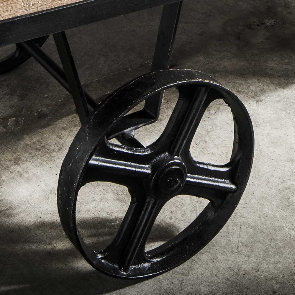 Rustikaler Design Couchtisch mit Eisenrädern - Pistroga