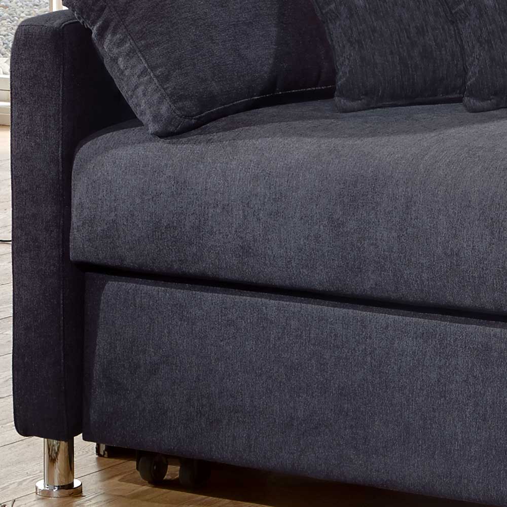 Dunkelblaue Couch mit Chromfüßen und Rollen für die Bettfunktion – Casbella