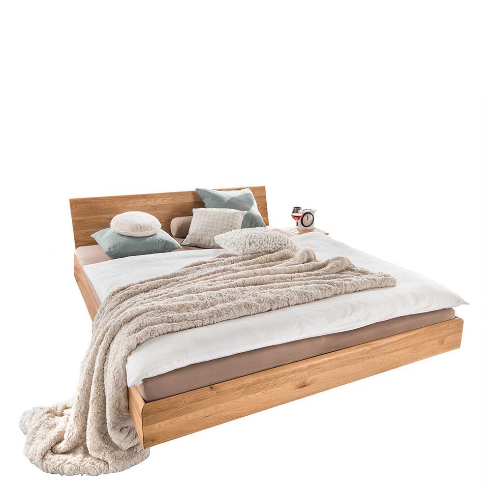 Schwebeoptik Bett aus Wildeiche Massivholz - Bampoka