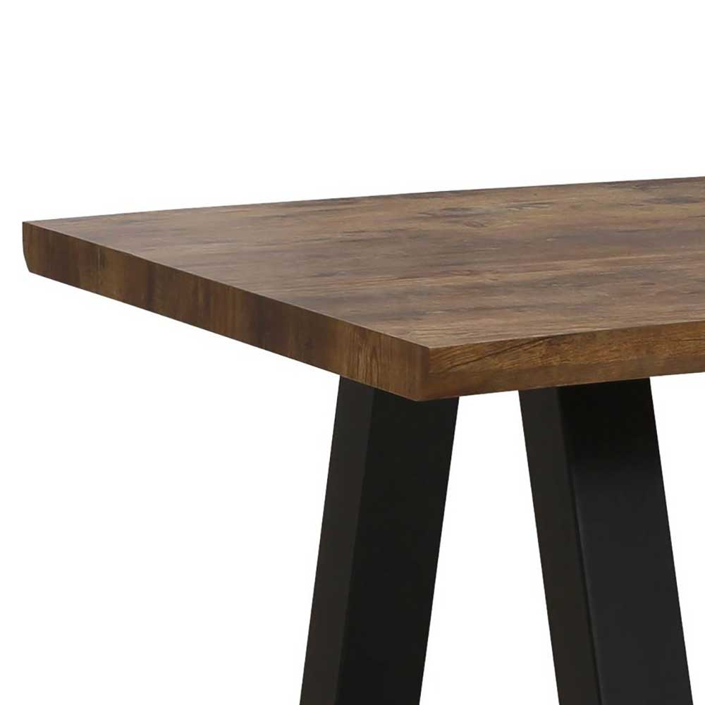 Eckdetail des Holztisches mit gerader Kante und dem oberen Teil des schwarzen Tischgestells – Miolosan