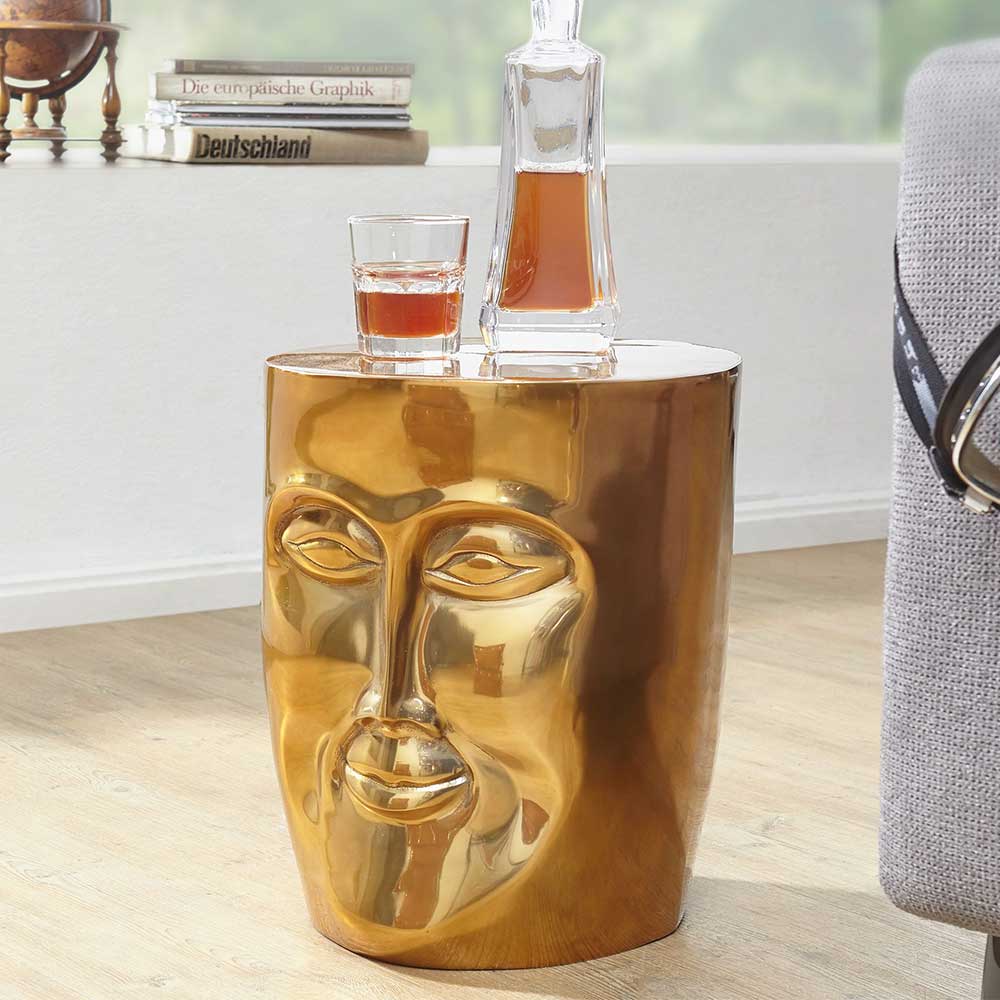 Goldfarbener Metalltisch mit Face Design - Grovossa