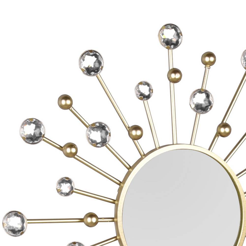 Goldener Wandspiegel mit glitzernden Kristall- und Kugeldetails am Strahlenrahmen – Linvares