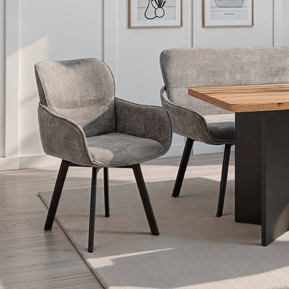 Zwei graue drehbare Esszimmerstühle am Holztisch, perfekt für ein modernes Esszimmer – Cary