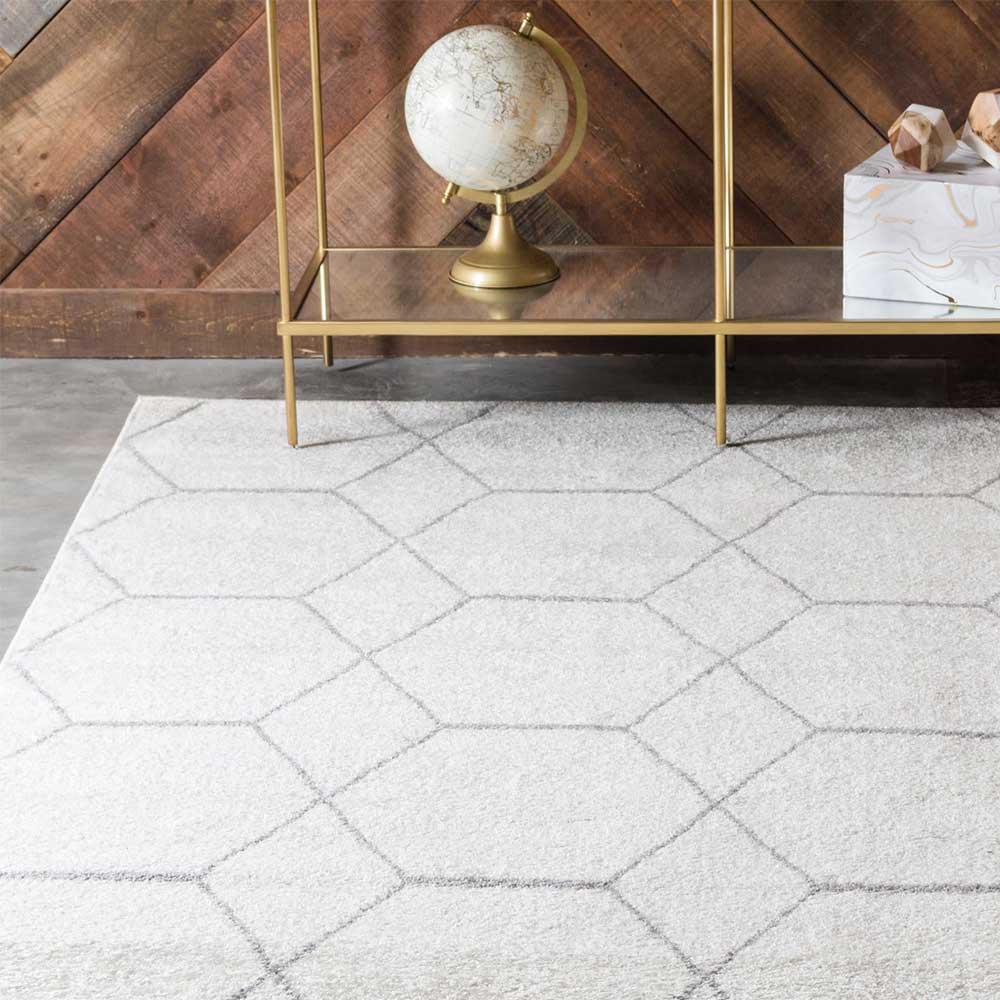 Heller Teppich mit geometrischem Muster - Blanco