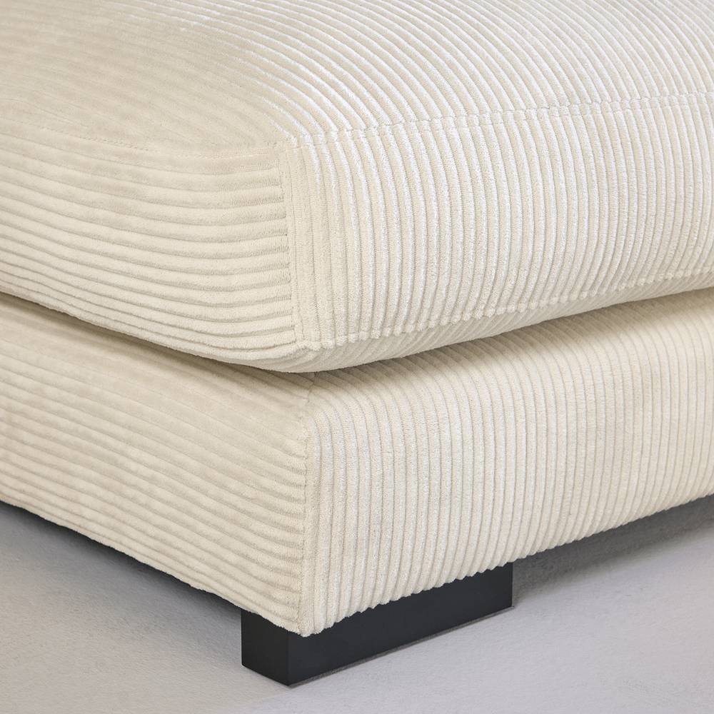Offwhite Cordstoff Textur des Sofas mit schwarzen Füßen Nahaufnahme – Fiva