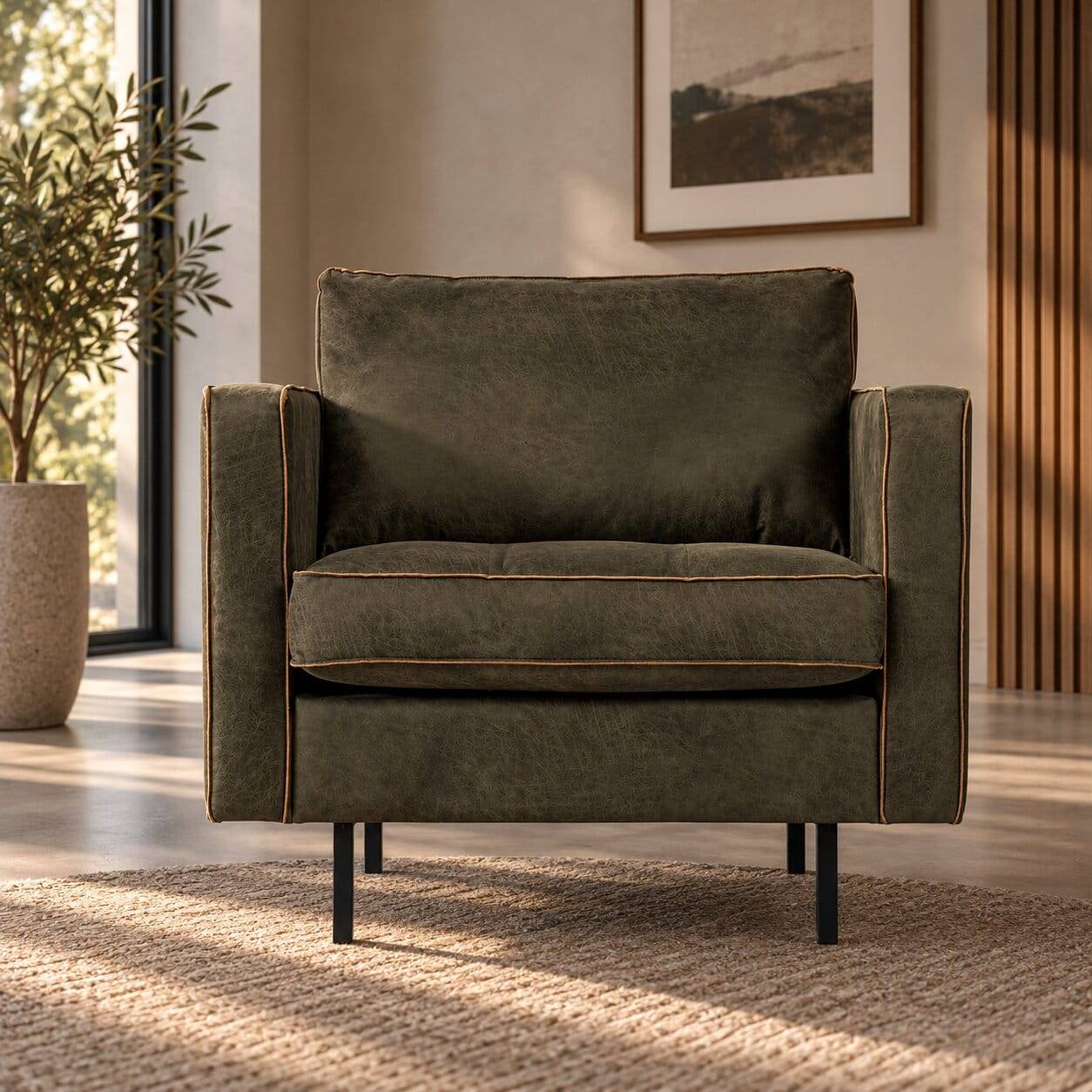 Olivgrüner Retro Sessel Onlio mit Ziernähten und schwarzen Metallfüßen im Wohnzimmer – Onlio