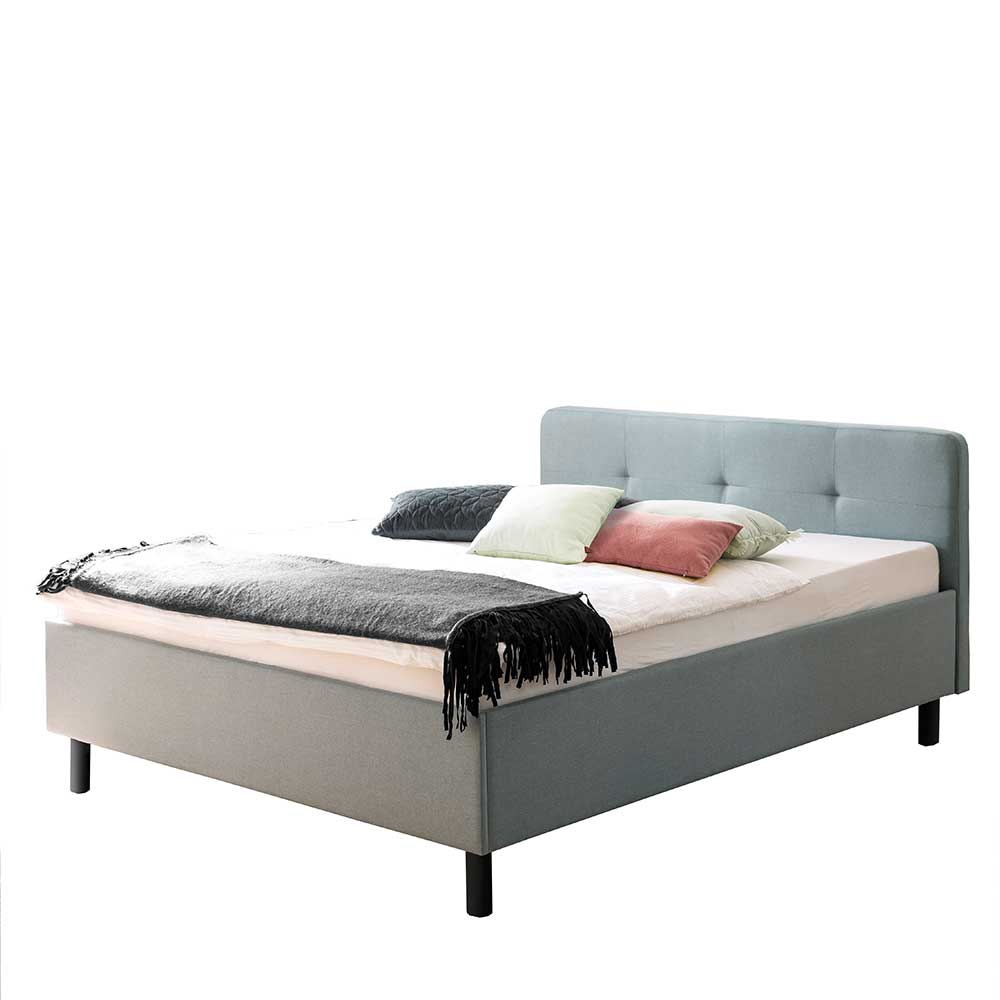 Doppelbett mit hellblauem Stoffbezug - Paryra