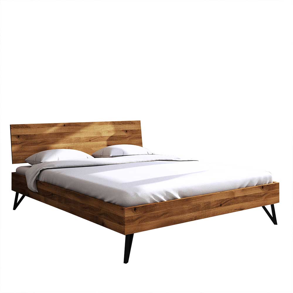 Holzbett mit 210 cm Länge aus Wildeiche geölt mit schwarzen Stahlfüßen Mandirov