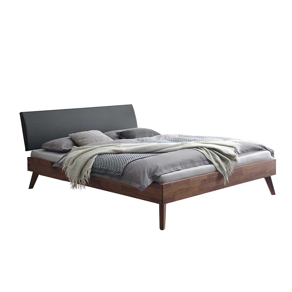 Modernes Bett aus Nussbaum Massivholz mit Kopfteil in Schwarz Palais