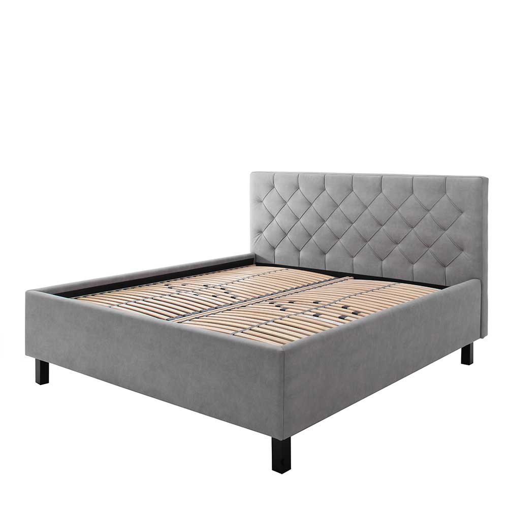 Modernes Stoffbett mit Bettkasten in Hellgrau mit schwarzen Holzfüßen Villaro