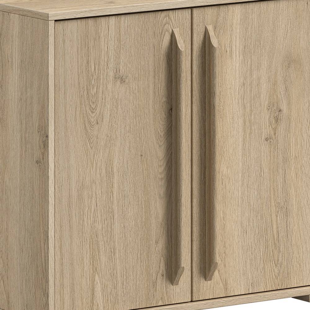 Kommode in Holzoptik mit zwei Soft-Close-Türen und integrierten Griffmulden auf der Front – Choice