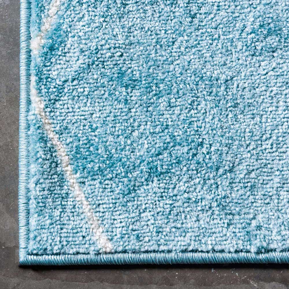 Grafisch gemusterter Teppich in Hellblau & Creme - Lizza