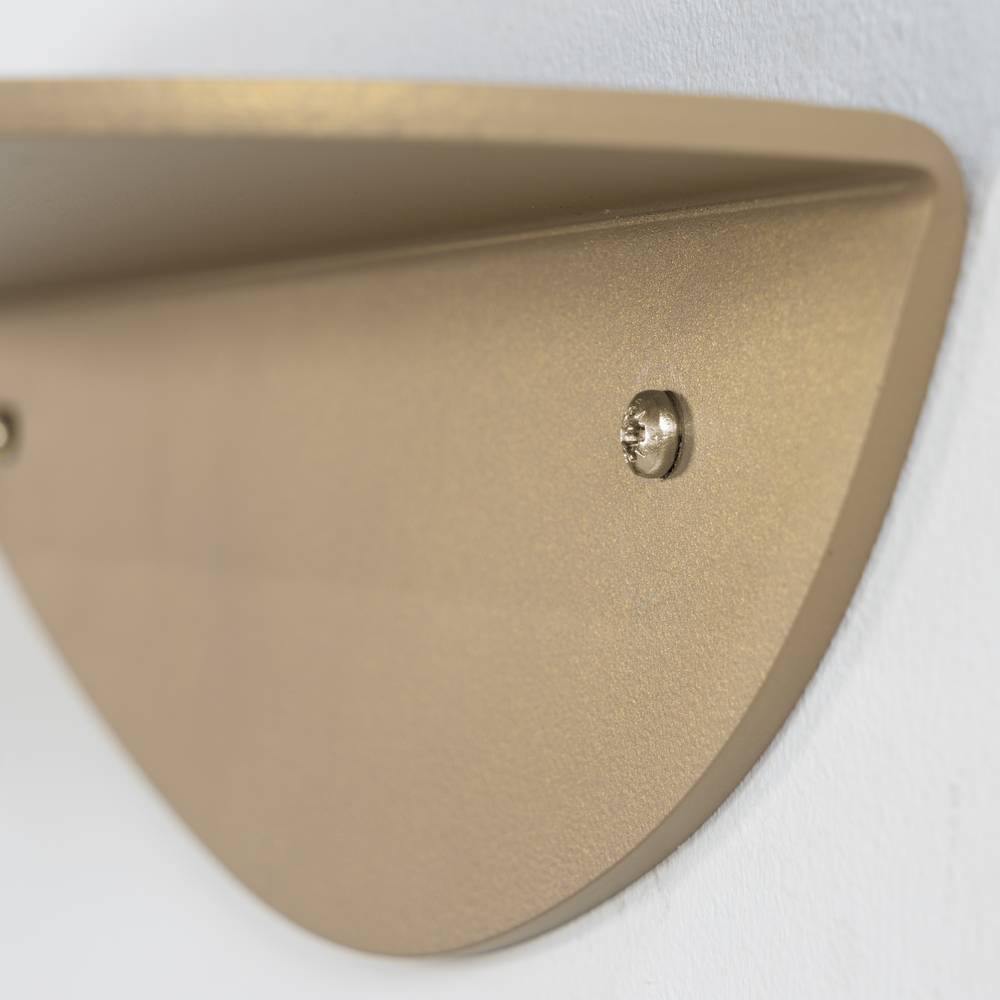 Detail der Befestigungsschrauben an der champagnerfarbenen Design Wandkonsole – Linvares