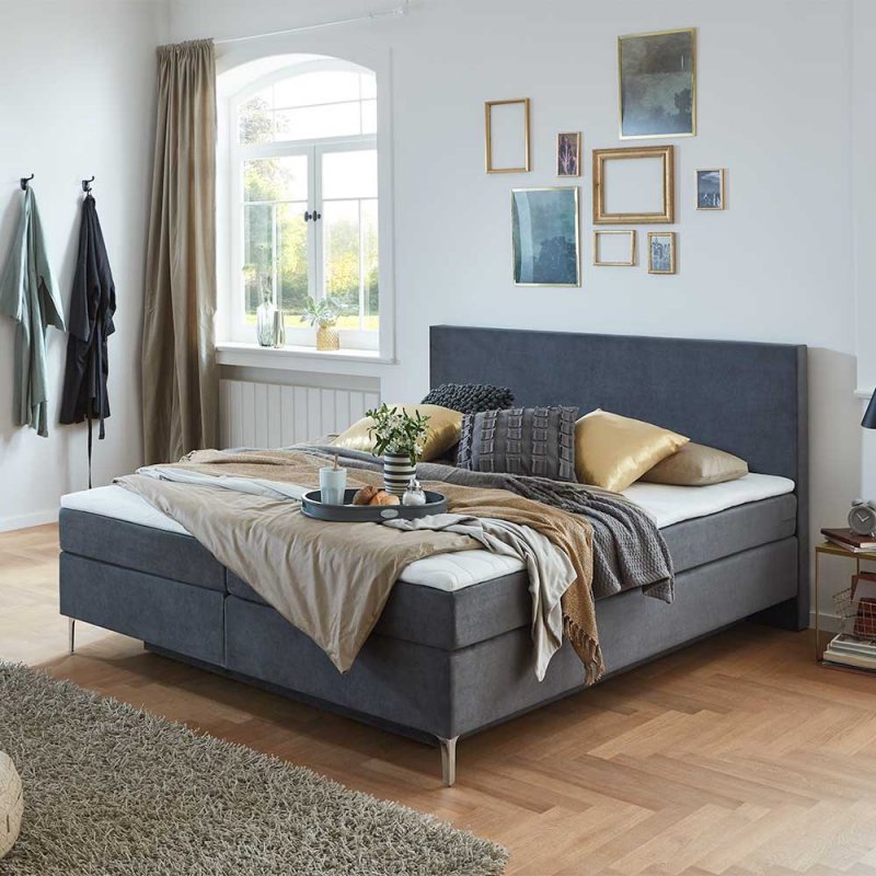 Dunkelgraues Boxspring-Bett mit Bettkasten inklusive Topp-Matratze - Jubby